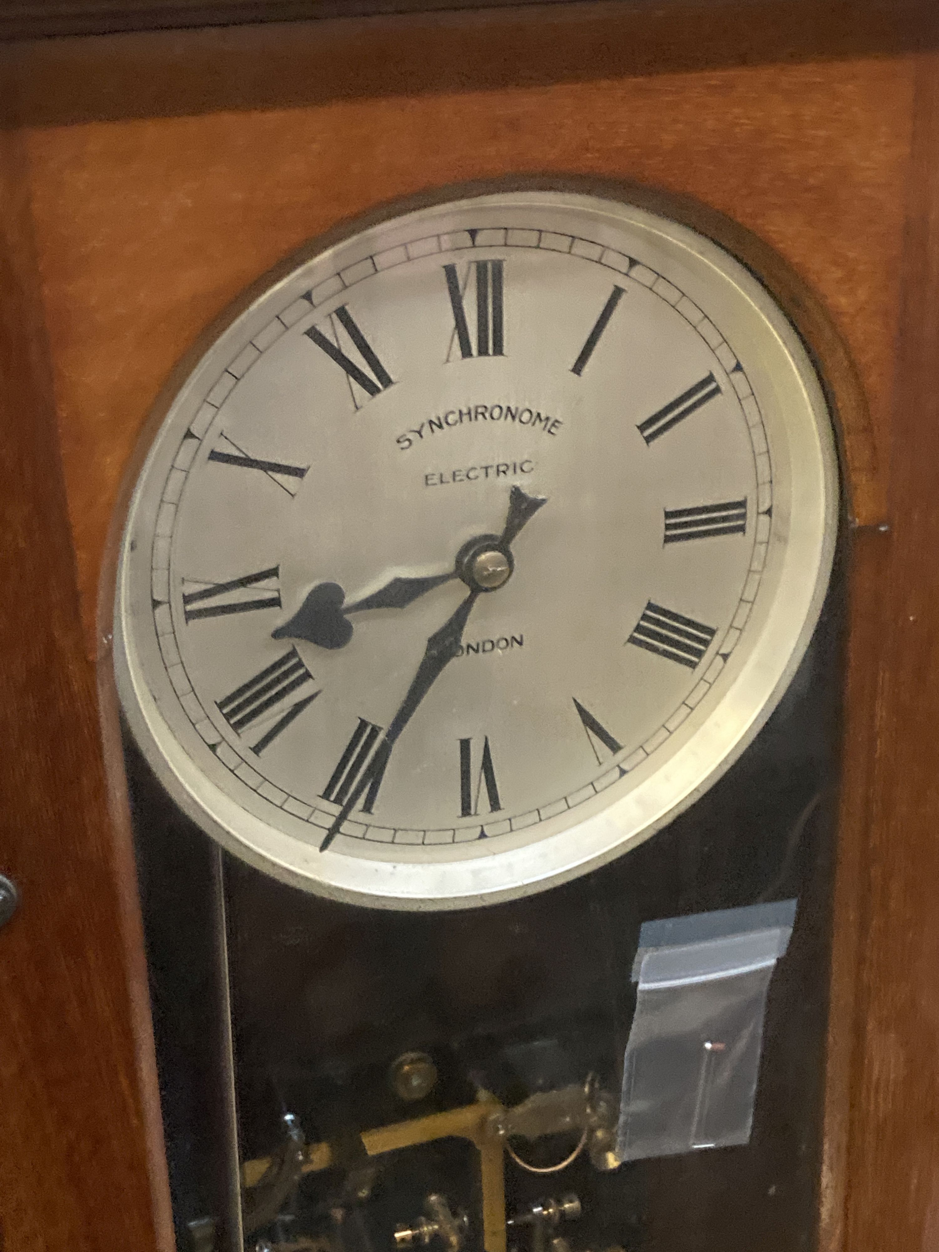 A Synchronome electric mahogany cased pendulum master clock, height 127cm together with a slave dial